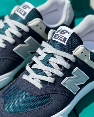 Photo of the New Balance Numeric 574 Vulc Skate Shoes in Navy Blue and Teal