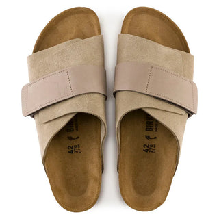 Taupe Birkenstock Kyoto sandals with nubuck/suede upper, adjustable hook and loop closure, and comfortable footbed.