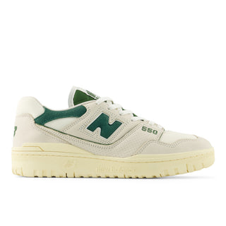New Balance 550 sneaker in Permafrost and Dark Alpine Green with leather upper, rubber outsole, and retro low-top style.