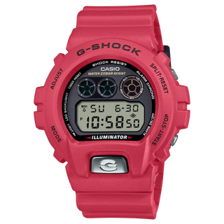 G-SHOCK DW6900TR-4 red digital watch with metal front button and anniversary detailing.