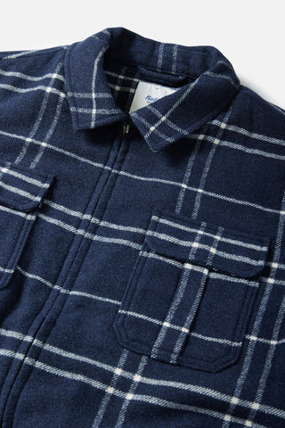 Indigo Katin Crosby Jacket, polyester-wool plaid flannel, sherpa liner, quilted sleeves, pockets, front zipper.