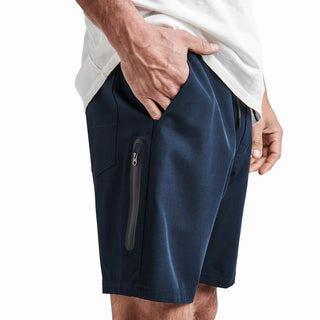 Dark navy Roark Explorer 2.0 Hybrid Shorts, 19" outseam, drawstring, zip pocket.