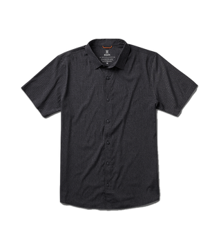 Roark Bless Up Shirt in black, lightweight perforated design, soft rubberized buttons, moisture-wicking Tactel™ fibers, short sleeve fit.