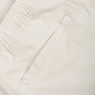 Light gray Dime Wave Quilted Shorts, polyester, wave pattern, hidden pockets, elastic waist, embroidered logo.