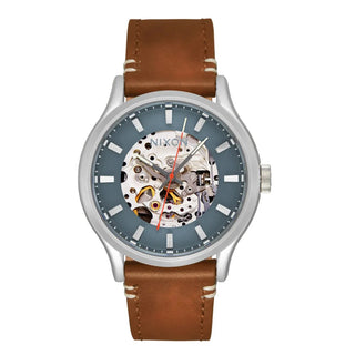 Nixon Spectra Leather Watch with skeleton face, automatic movement, light gunmetal case, and sienna leather band.