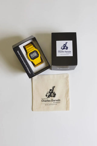 Yellow Charles Darwin 5600 G-Shock Digital Watch displayed with its sustainable box and eco-friendly ba