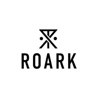 Roark's crest, an emblem of unbridled curiosity and wilderness adventure, poised against the canvas of a world brimming with unexplored trails and secret paths.