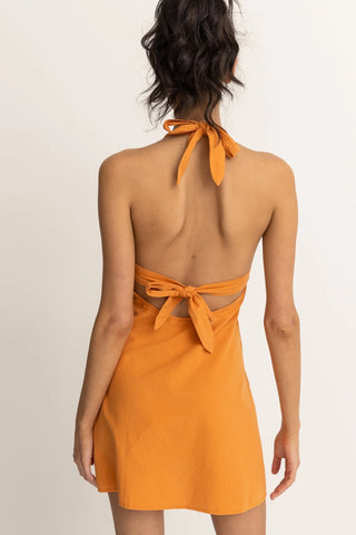 Orange mini halter dress with tie back and low open back.