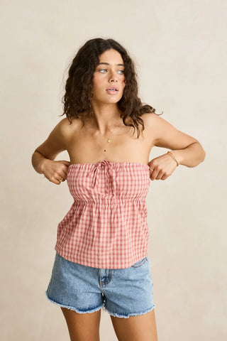 Rhythm Kirra Check Strapless Top in Pink, soft seasonal check pattern with ruffled hem, adjustable front tie, and elasticated neckline and underbust for a secure strapless fit