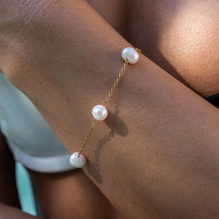 ALCO Rosemary bracelet in 18K gold-plated stainless steel with freshwater pearls, lobster clasp, and 6.5 inch length.