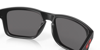 "Oakley Holbrook sunglasses in Matte Black frame with Positive Red Iridium lenses — iconic unisex sunglasses with UV400 protection"
