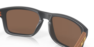 "Oakley Holbrook Prizm Polar sunglasses in Matte Carbon frame with Prizm 24K Polarized lenses — premium gold mirror polarized sunglasses with UV400 protection"
