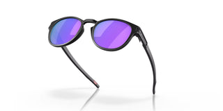 Oakley Latch sunglasses with lightweight O Matter frame, Prizm Violet lenses, and clip hinge for shirt attachment.