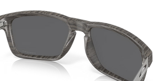 "Oakley Holbrook Mix sunglasses in Woodgrain frame with Prizm Black lenses — premium lifestyle sunglasses with UV400 protection"