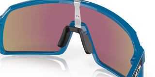 Oakley Sutro sunglasses, Sky Blue frame, Prizm Sapphire lenses, designed for cycling, enhance color and contrast.