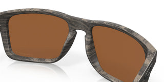 Oakley Holbrook XL Prizm Polar Sunglasses in Woodgrain with Prizm Tungsten Polar lenses, iconic keyhole bridge and metal rivets O Matter lightweight frame with three-point fit, Plutonite lens with 100% UVA UVB protection up to 400nm, HDO optics, fits medium to extra large faces