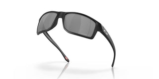 Oakley Gibston Prizm Polar Sunglasses in Matte Black with Prizm Black Polar lenses, high-wrap O Matter lightweight frame with hat compatible temple design, extended periphery, three-point fit for precise optical alignment, 11% light transmission grey base lens optimized for bright light