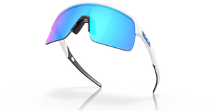 "Oakley Sutro Lite sunglasses in Matte White frame with Prizm Sapphire lenses — lightweight shield sport sunglasses with blue mirror finish and UV400 protection"