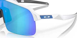 "Oakley Sutro Lite sunglasses in Matte White frame with Prizm Sapphire lenses — lightweight shield sport sunglasses with blue mirror finish and UV400 protection"