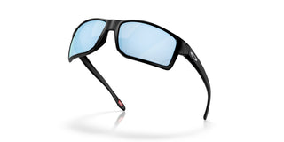 Oakley Gibston XL Prizm Polar Sunglasses in Matte Black with Prizm Deep Water Polar lenses, high-wrap O Matter lightweight frame with mold-in nosepads, hooked temples, hat compatible design, extended periphery, three-point fit for precise optical alignment