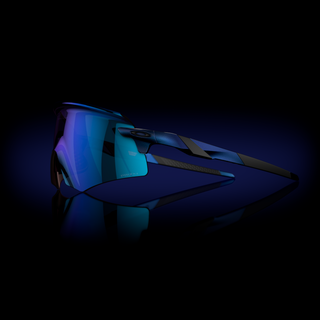 Oakley Encoder Solstice Collection sunglasses, Matte Cyan/Blue Colorshift frame, Prizm Sapphire lenses, designed for multi-sport performance.