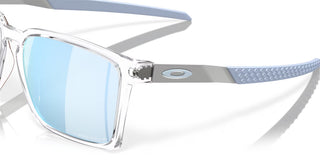 Oakley Exchange Sun Prizm Polar Sunglasses in Polished Clear with Prizm Deep Water Polar lenses, mixed material O Matter front with stainless steel temples and B1B grip textured Unobtainium earsocks, 12% light transmission rose base lens optimized for bright light and water conditions