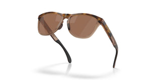 Oakley Frogskins Range XL Prizm Polar Sunglasses in Brown Tort and Brown Smoke with Prizm Tungsten Polar lenses, O-Matter injection molded thermoplastic XL frame with Unobtainium nosepad, 14% light transmission bronze base lens optimized for bright light, classic 1980s Frogskins silhouette engineered for larger heads