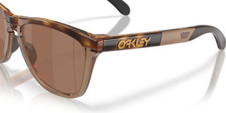 Oakley Frogskins Range XL Prizm Polar Sunglasses in Brown Tort and Brown Smoke with Prizm Tungsten Polar lenses, O-Matter injection molded thermoplastic XL frame with Unobtainium nosepad, 14% light transmission bronze base lens optimized for bright light, classic 1980s Frogskins silhouette engineered for larger heads