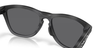 Oakley Frogskins Range XL Prizm Polar Sunglasses in Matte Tort Grey Smoke and Matte Black with Prizm Black Polar lenses, O-Matter injection molded thermoplastic XL frame with Unobtainium nosepad, 11% light transmission optimized for bright light, classic 1980s Frogskins silhouette engineered for larger heads