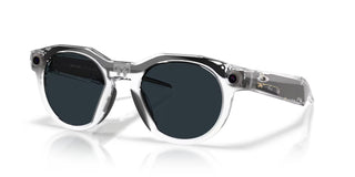 Oakley Meta HSTN Transitions smart glasses in Clear with Transitions Grey lenses, Meta AI, camera, and audio.