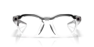 Oakley Meta HSTN Transitions smart glasses in Clear with Transitions Grey lenses, Meta AI, camera, and audio.