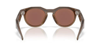 Oakley Meta HSTN smart glasses in Brown Smoke with Prizm Deep Water Polarized lenses, Meta AI, camera, and audio.