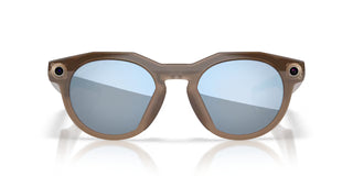 Oakley Meta HSTN smart glasses in Brown Smoke with Prizm Deep Water Polarized lenses, Meta AI, camera, and audio.