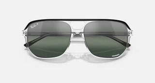 Ray-Ban Bill One sunglasses with polished black on transparent acetate frame and silver/blue Chromance lenses.
