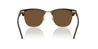 Ray-Ban Clubmaster Classic sunglasses in Polished Brown and Gold with Dark Brown lenses — iconic square acetate frame with adjustable nosepads and 100% UV protection.

