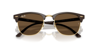 Ray-Ban Clubmaster Classic sunglasses in Polished Brown and Gold with Dark Brown lenses — iconic square acetate frame with adjustable nosepads and 100% UV protection.

