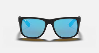 Ray-Ban Justin Sunglasses RB4165 in Matte Rubber Black with Blue Mirror Flash lenses, square rectangle nylon frame with rubberized finish and black temples, 54mm lens width, 43.9mm lens height, 145mm temple length, Wayfarer-inspired bold style