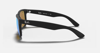 Ray-Ban Justin Sunglasses RB4165 in Matte Rubber Black with Blue Mirror Flash lenses, square rectangle nylon frame with rubberized finish and black temples, 54mm lens width, 43.9mm lens height, 145mm temple length, Wayfarer-inspired bold style