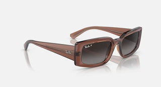 Ray-Ban Kiliane Bio-Based RB4395 sunglasses with polished transparent brown acetate frame and gradient grey lenses.