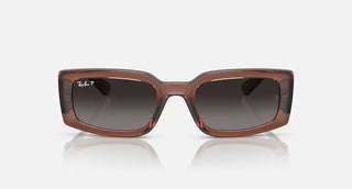 Ray-Ban Kiliane Bio-Based RB4395 sunglasses with polished transparent brown acetate frame and gradient grey lenses.