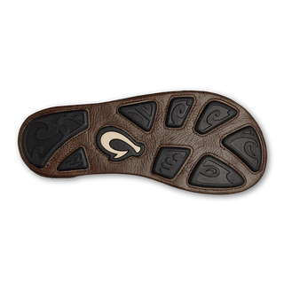 OluKai Hiapo Men's Leather Sandals in Rum/Dark Wood — naturally tumbled marbled full-grain leather with Polynesian whipstitching, moko tattoo footbed, leather-wrapped outsole, and non-marking rubber traction pods