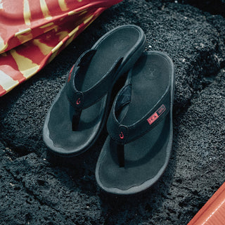 OluKai 'Ohana Men's Beach Sandals in Black/HLA, water-resistant synthetic straps with quick-drying jersey knit lining, soft nylon toe post, anatomically contoured footbed, and non-marking rubber outsole