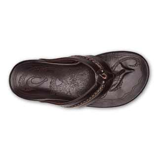 OluKai Mea Ola Leather Sandals in Dark Java/Dark Java — premium full-grain leather with canoe lash whipstitching, octopus laser-etched footbed, microfiber lining, and handsewn leather toe post