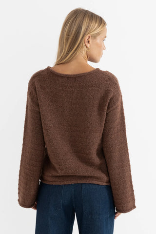Rhythm Baklava Knit sweater in chocolate with boat neckline and wide sleeves.