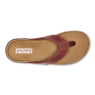 OluKai Tuahine Leather Beach Sandal in Red Ochre/Tan — waterproof full-grain leather with Hawaiian-inspired stitching, anatomically contoured footbed, and non-marking wet grip outsole