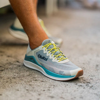 OluKai 'Ahi Shoes in Seagreen/White Sand - water-resistant mesh sneakers with cushioned EVA footbed, Wet Grip Rubber® outsole, and drainage windows