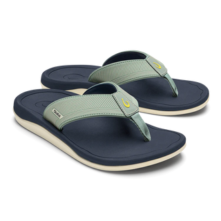 OluKai 'Ahi Kai Men's Beach Sandals in Seagreen/Trench Blue, NaluFoam cushioned midsole with secure strap design, quick-drying nylon toe post, and barnacle-inspired Wet Grip rubber outsole