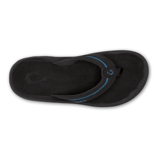 OluKai 'Ohana Pālua Men's Beach Sandals in Black/Slate Blue, synthetic split strap with jersey knit lining, signature 'Ohana compression-molded EVA footbed, and non-marking rubber coral-inspired lug outsole