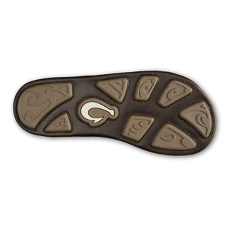 OluKai Mea Ola Mano leather sandals in Dark Java/Mustang with woven straps and shark-inspired etched detailing.