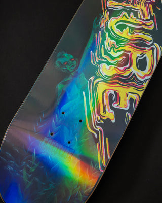 Creature 9.0 inch Willis Kimbel Deep Dive skateboard deck with surreal artwork by Violet Aveline and prismatic foil underlay.
